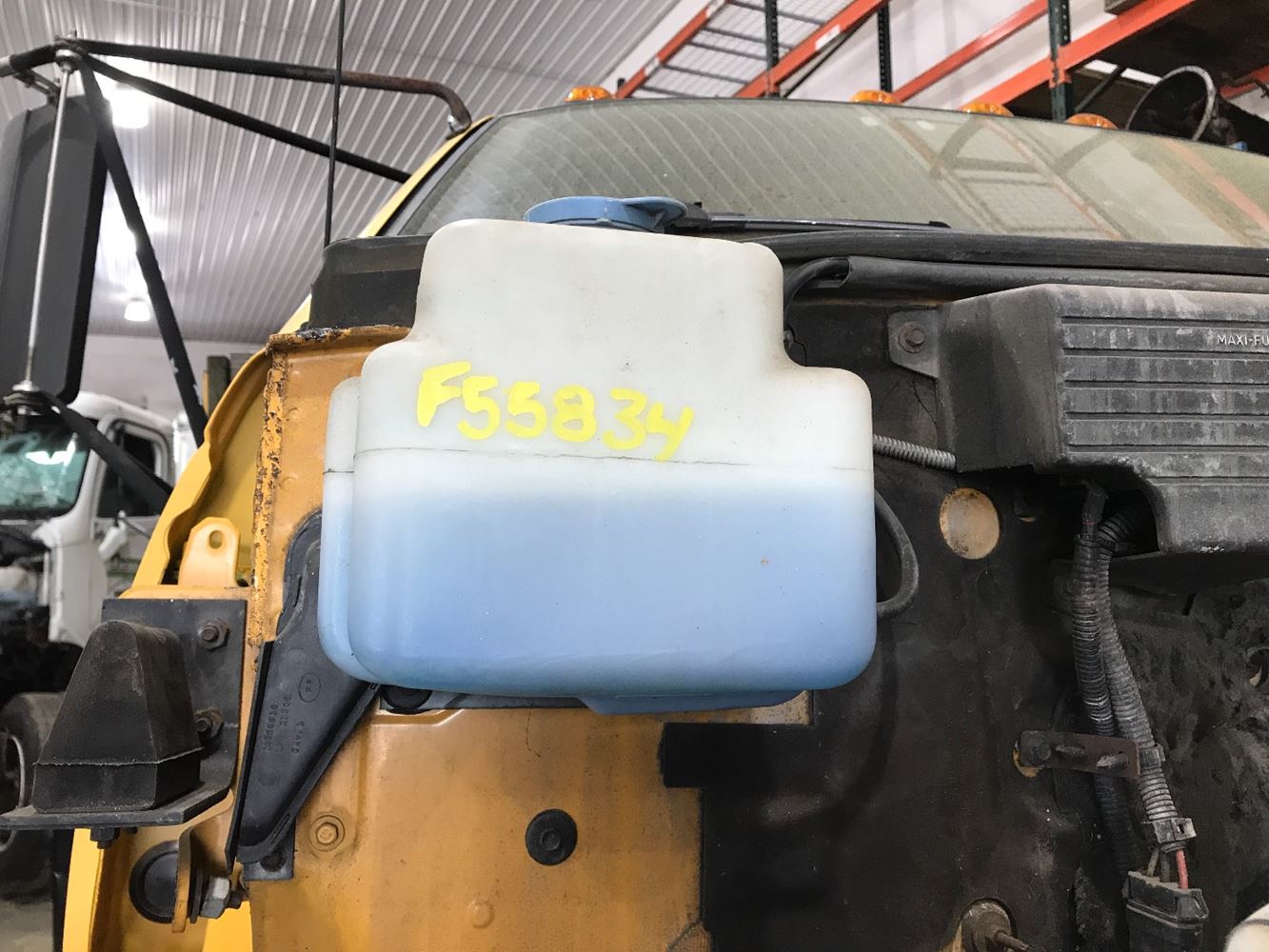 Image 1 of part Used 1992 GMC C6000 Topkick Windshield Washer Reservoir