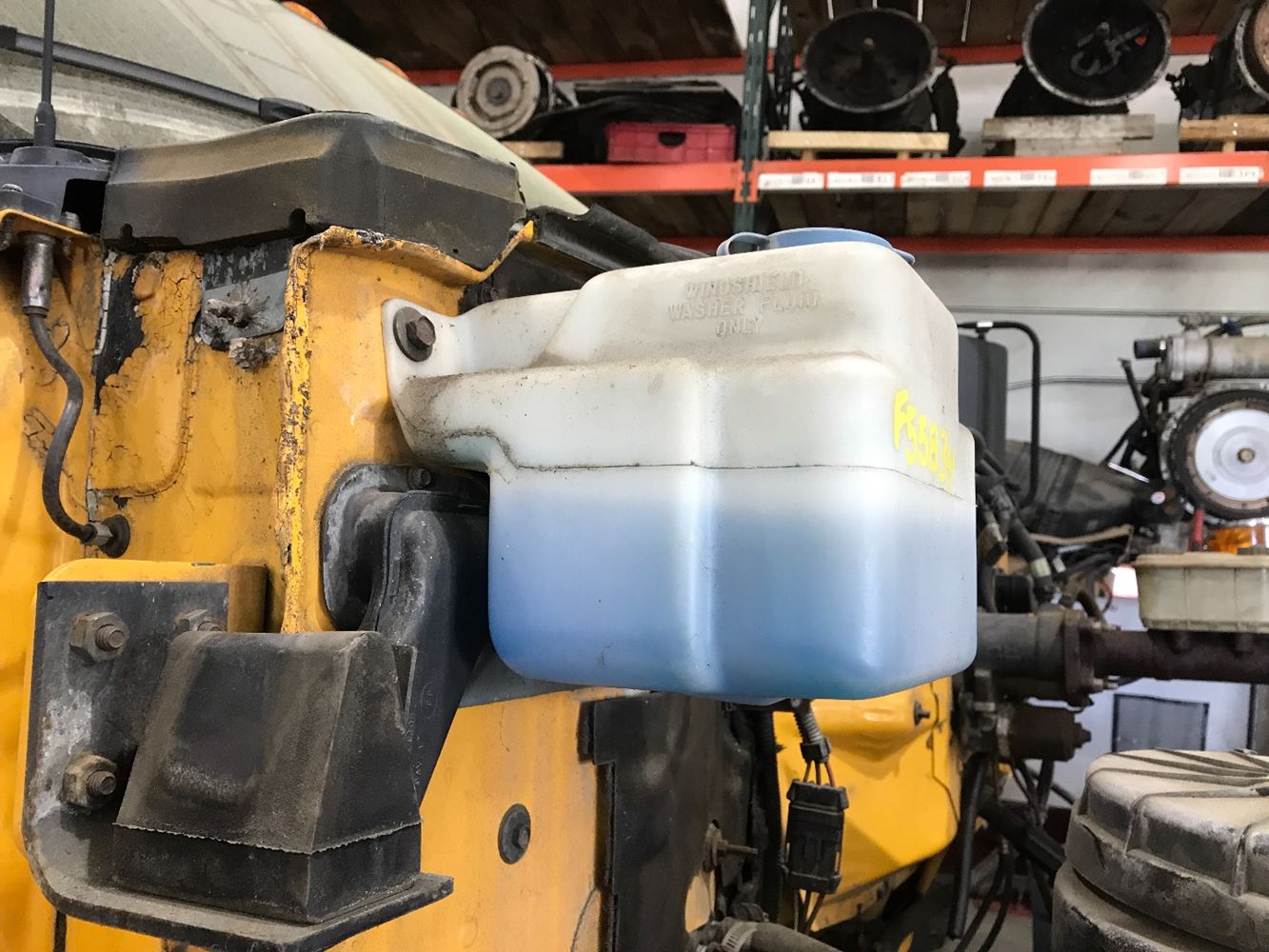 Image 2 of part Used 1992 GMC C6000 Topkick Windshield Washer Reservoir