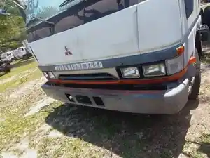 Used 2001 Mitsubishi FE Grille (Stock #242-000953-12)) Part Image